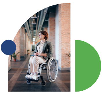 Person in wheelchair in an industrial styled office. 