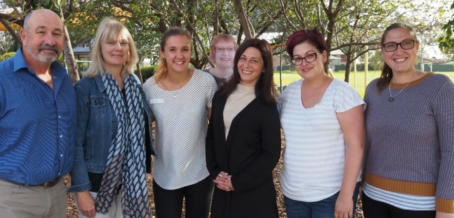 Group photograph of the SPEVI Local Organising Committee. From left to right; Roley Stewart, Jo Minniss, Mel Holland, Angela Helps (cutout), Christina Abbracciavento, Skye Jones and Hannah O'Brien