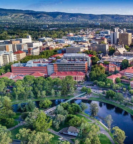 Photo of Adelaide during the day with the Torrens river in front