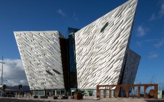 Exterior of Titanic Belfast, shaped like the hull of a ship