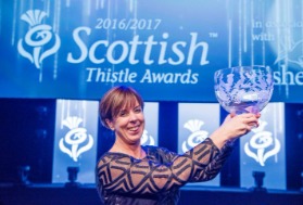 2016/17 Silver Thistle winner, Freda Newton holding the Silver Thistle trophy
