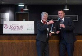Tourism & Hospitality Hero winner, Jean Ryrie pictured with Scott Inglis from Headline sponsor, Fishers